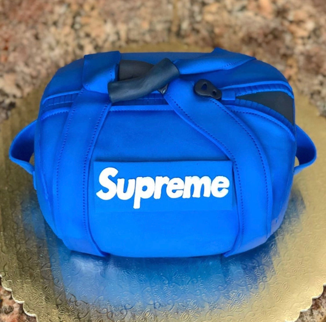 SUPREME Duffle Bag Cake Baked by Bri