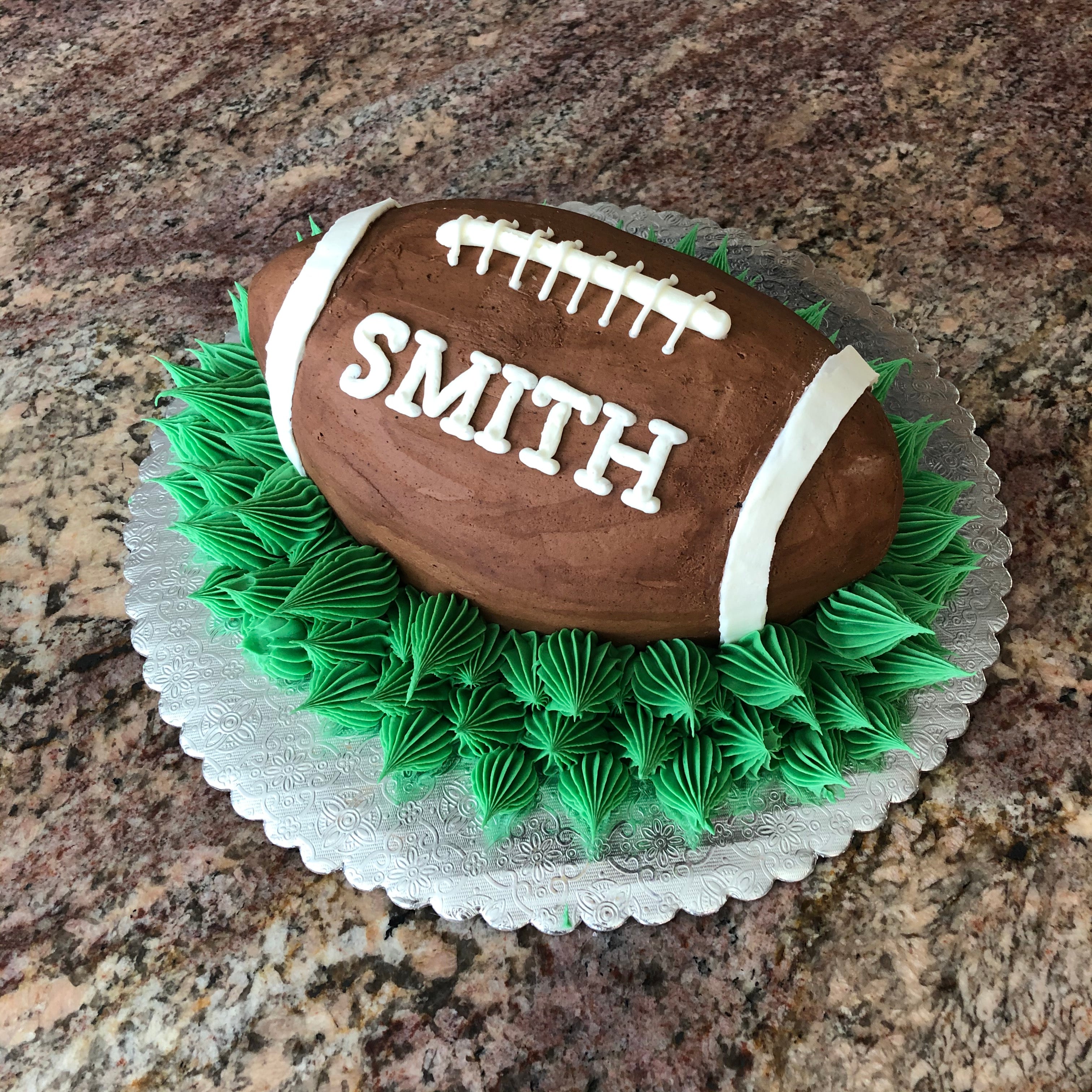 Football with Poptop on Round Cake – Tiffany's Bakery